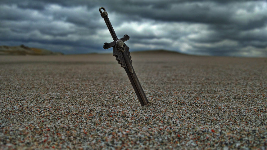Sword in sand, standing for the end