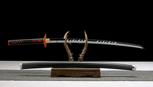 Japanese katana sword with patterned blade displayed on a decorative stand with its sheath below.