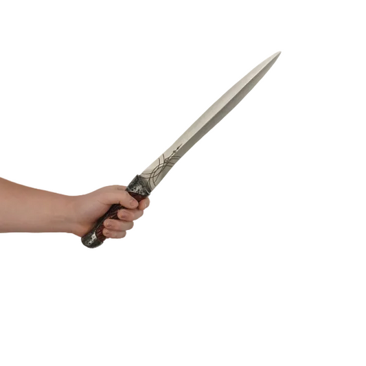 Hand holding a sword against a plain background