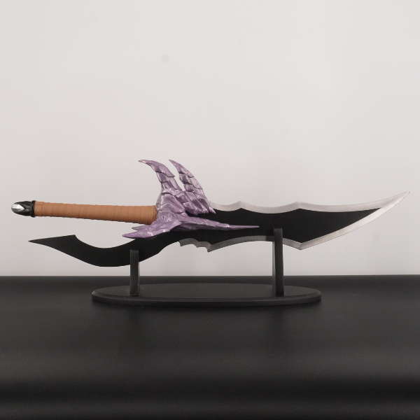 Decorative weapon with a purple blade on a black stand against a gray background