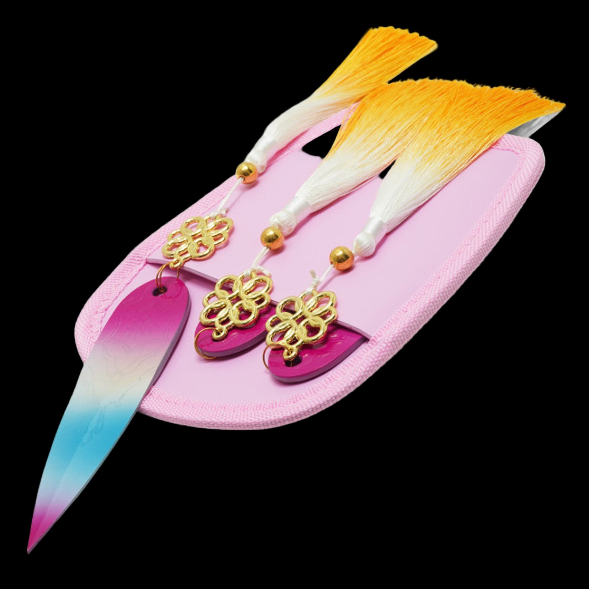 Decorative knife with colorful blade and tassels on a pink sheath
