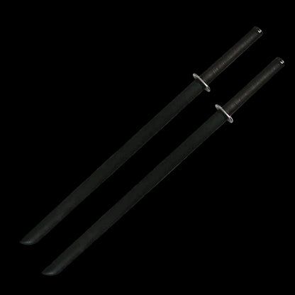 Two black swords with sheaths on a black background